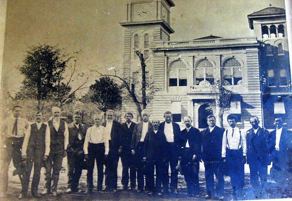 Unknown Men - Can you help identify these men in front of the Bradley County Courthouse?