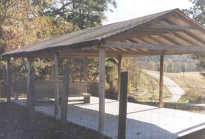 The road heads towards Mt. Ida. This shelter is outside the cemetery  fence. 