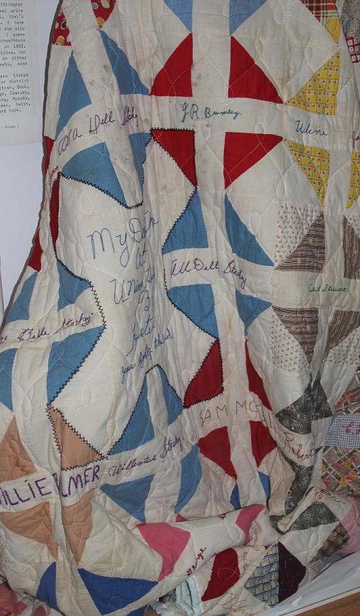 Friendship quilt c. 1940 with feather stitching in the center.